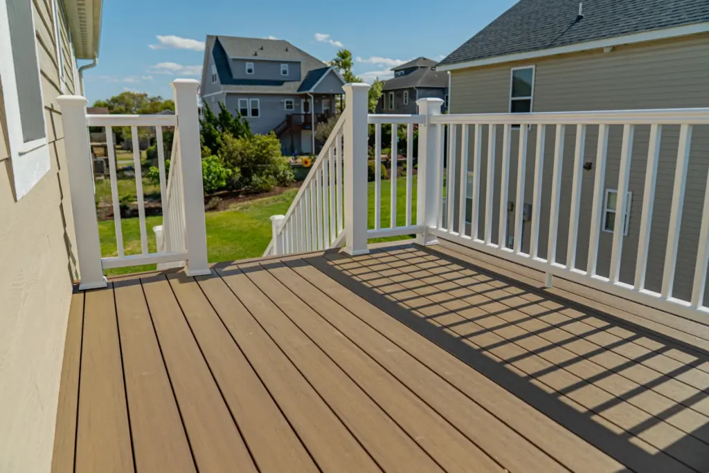 spacious-composite-deck-with-white-railing-on-the-residential-house-in-outer-banks-nc